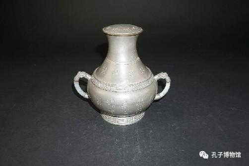 清錾刻金文壶形锡水囤.png
